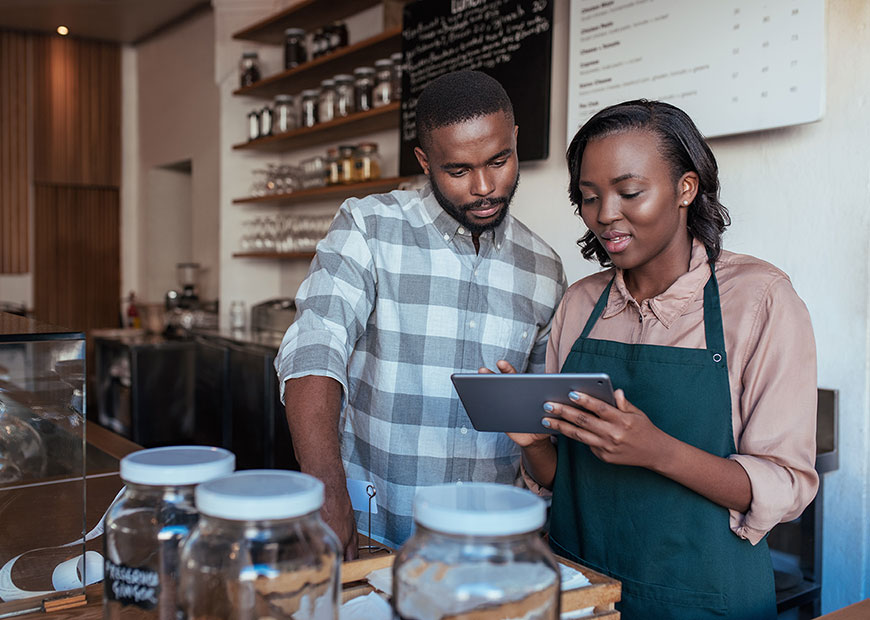image of two people working at a small business