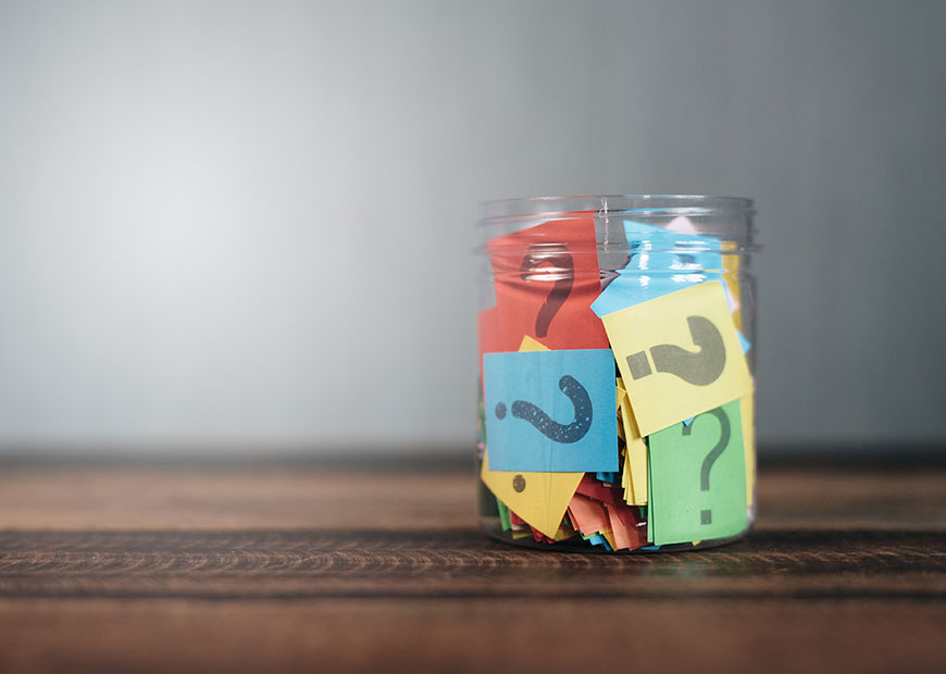 image of jar filled with colored papers with question marks on them