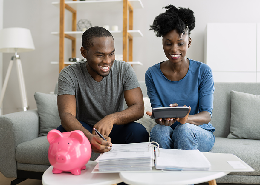 image of a couple calculating savings